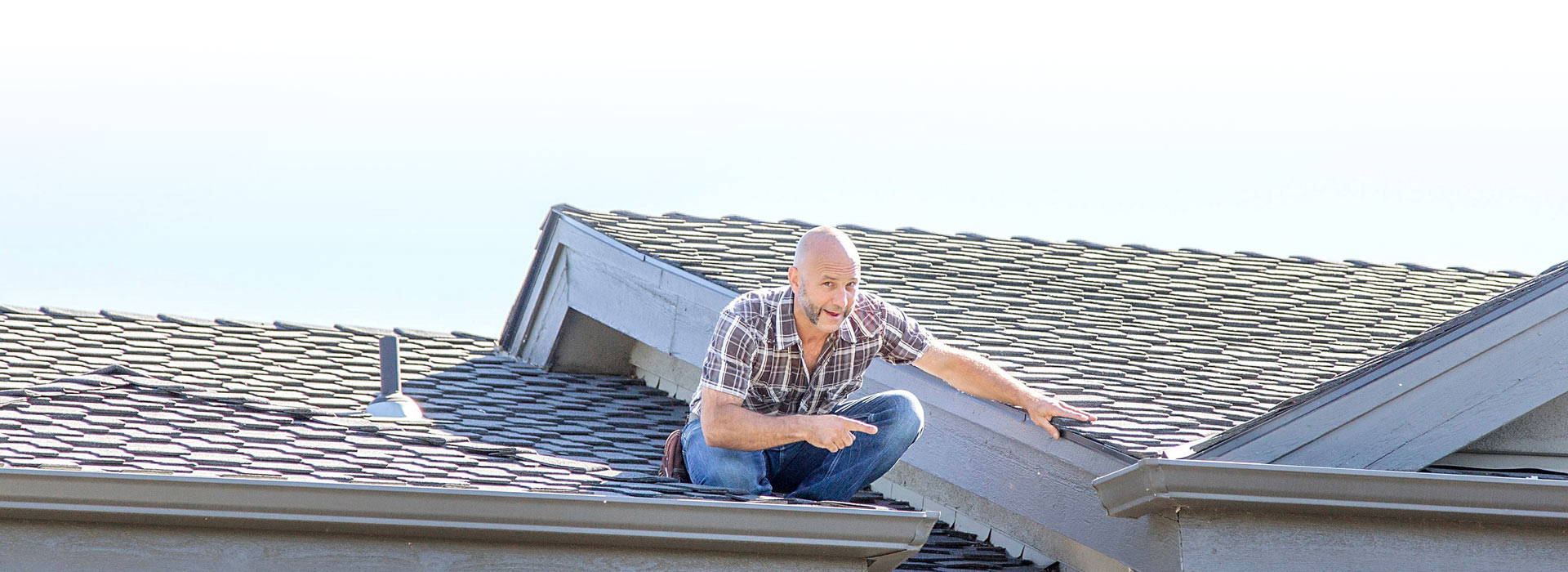 Certified Home Inspector Chris Callor performing a roof home inspection